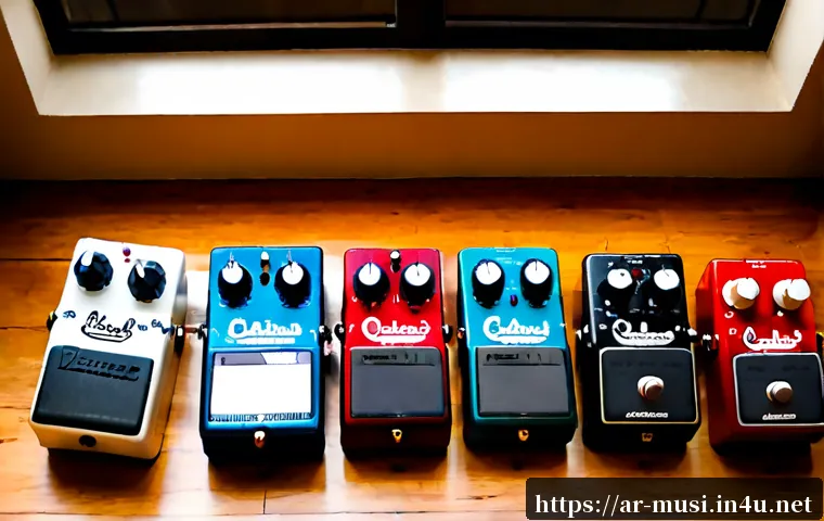 기타 이펙트 페달 종류 - Photorealistic overhead comparison of six distinct guitar effects pedals arranged neatly on a warm w...